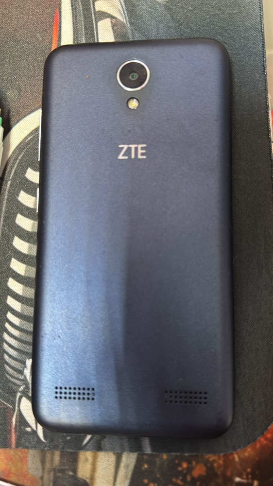 Мобильный телефон ZTE  32